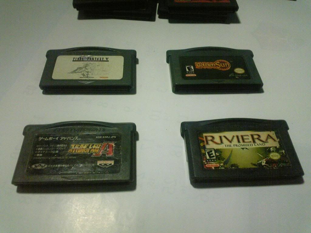 Nintendo DS màu bạc và một con gameboy mới 95% ... end time 22h00 ngày 10/04