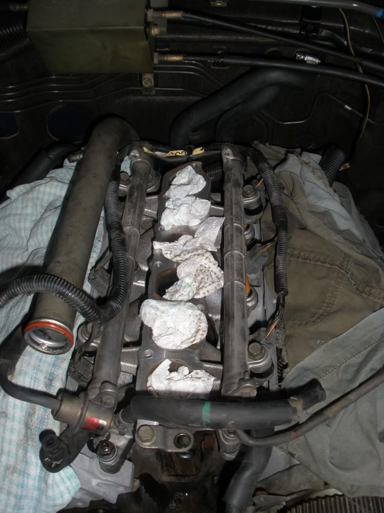 Fit the lower inlet manifold and injectors and fuel manifolding.